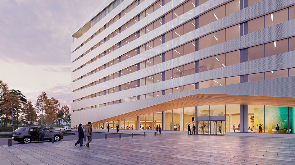 Kampuksen puinen sisäänkäyntikatos kaareutuu kutsuvasti. 