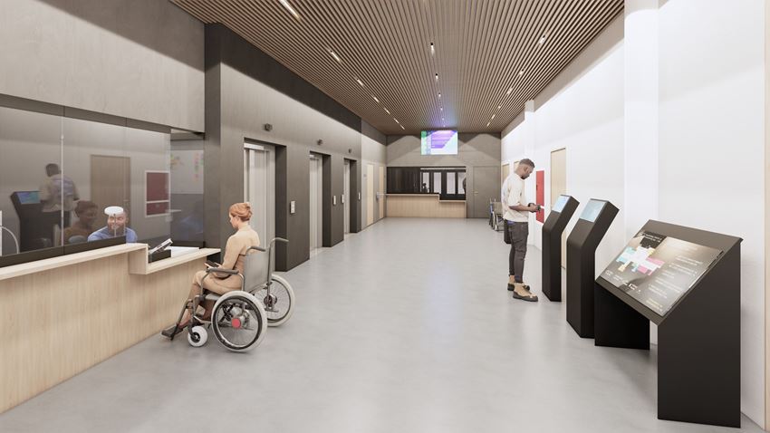 Havainnekuva Kampin terveys- ja hyvinvointikeskuksen sisäänkäynnin hissiaulasta