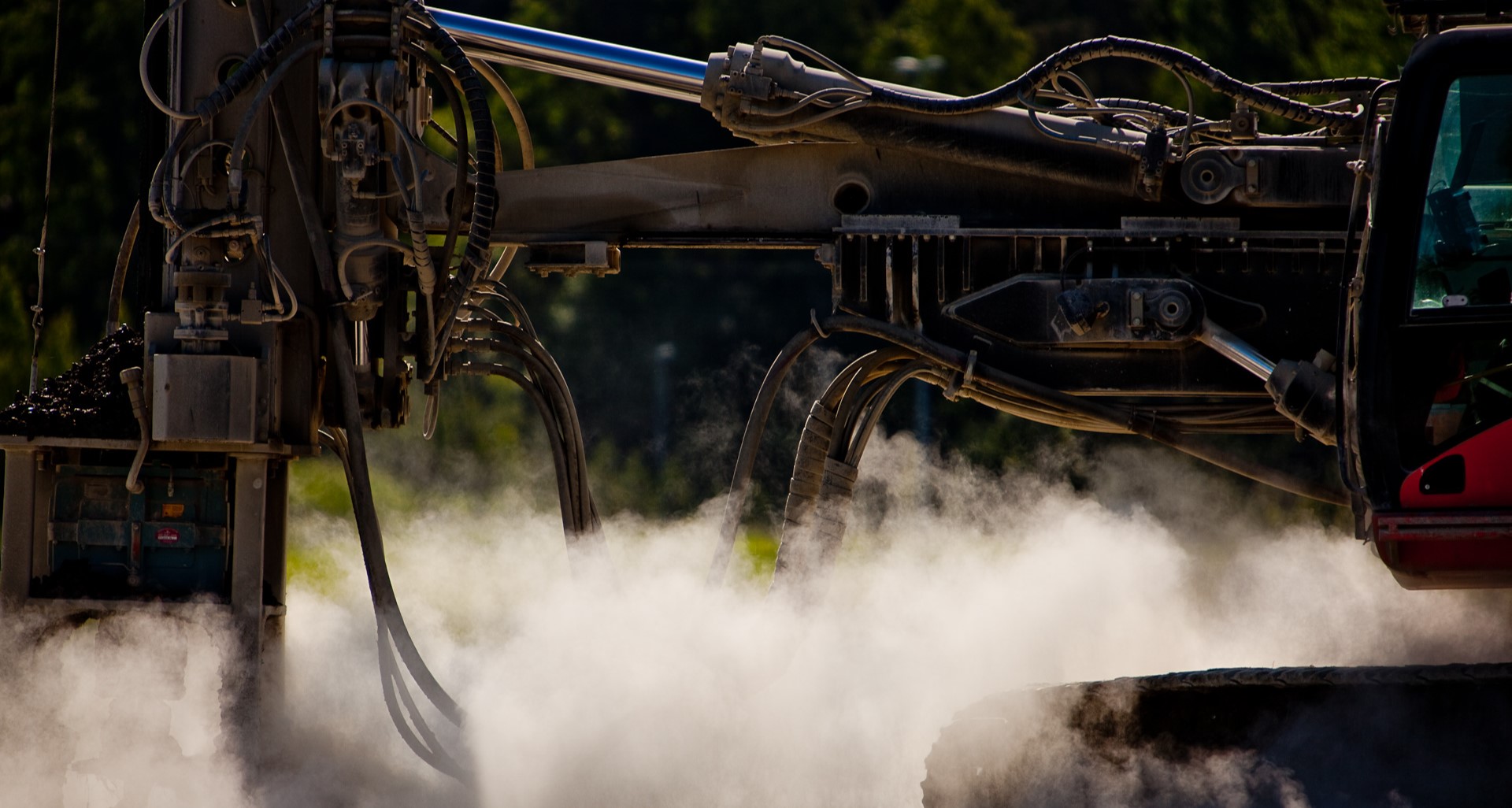 Close-up of a soil stabilization machine performing ground improvement work at an infrastructure construction site